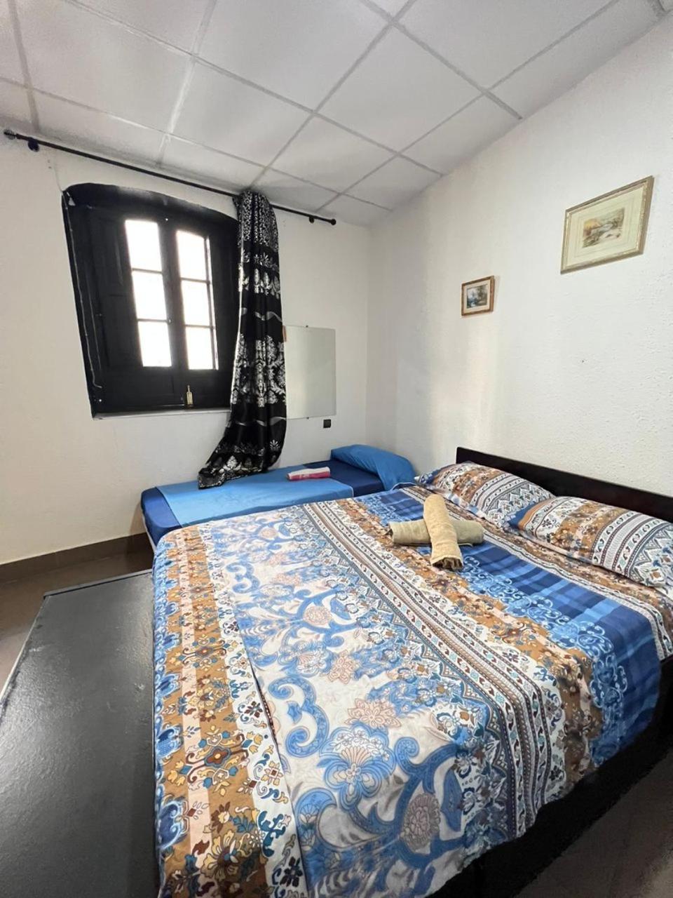 Hostal Milan Alicante Zewnętrze zdjęcie A bedroom in a guest house in India